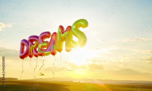 Bright balloons letters form the inscription dreams fly in the blue sky