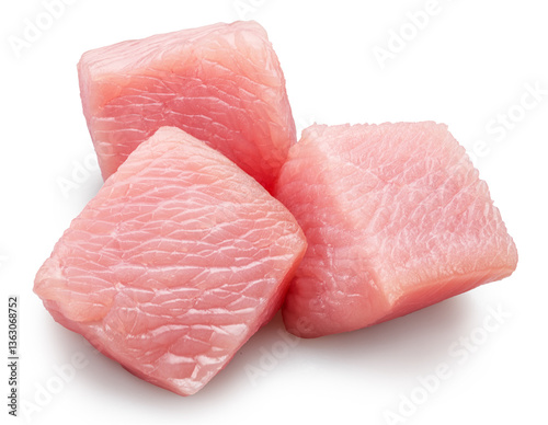 Foto Three turkey meat cubes isolated on white