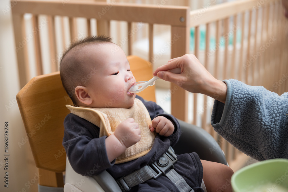 First Time Baby Trying Solid Food with Spoon