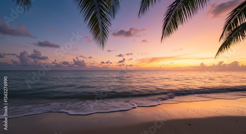 Calm Ocean Waves at Sunset with Palm Trees and Colorful Sky
