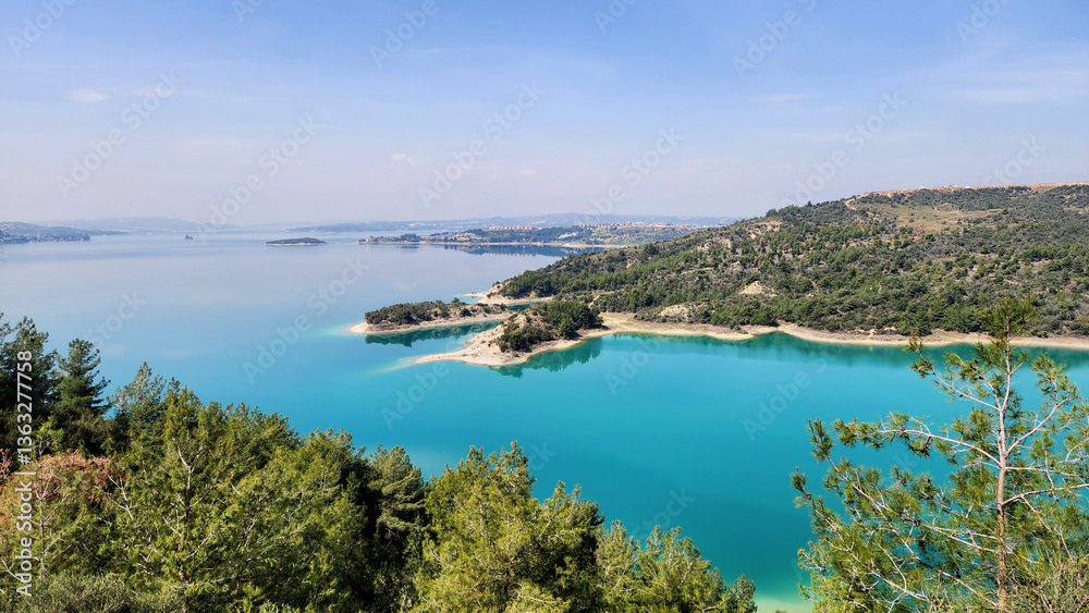 It is mesmerizing to watch the turquoise splendor of Seyhan Lake under the spring sunshine. It is mesmerizing to watch the turquoise splendor of Seyhan Lake under the spring sunshine.