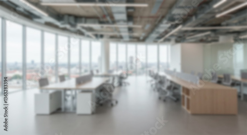 Blurry background of a modern office with windows. Employee office with cubicles