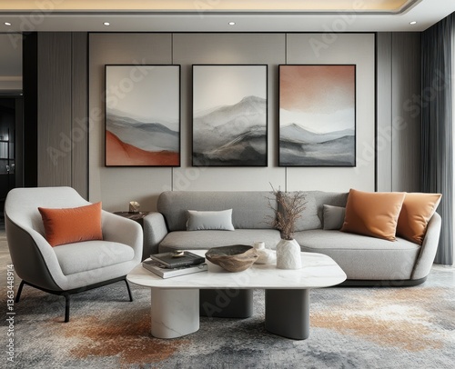 Modern living room with grey sofa, armchair, and abstract art.