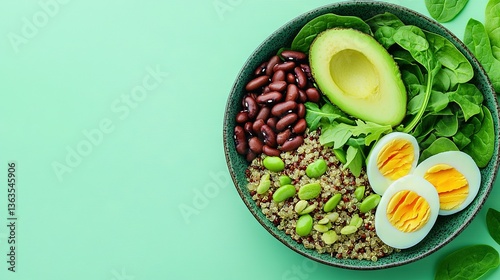 Wallpaper Mural  Blue background with eggs, beans, spinach, avocado, and spinach leaves in a bowl of food Torontodigital.ca