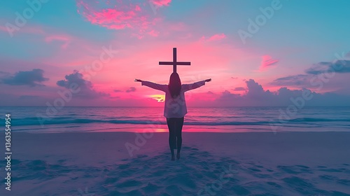 A person holding a cross at sunset on a sandy beach