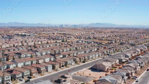 Aerial drone shot of Las Vegas city skyline with residential homes and houses 01