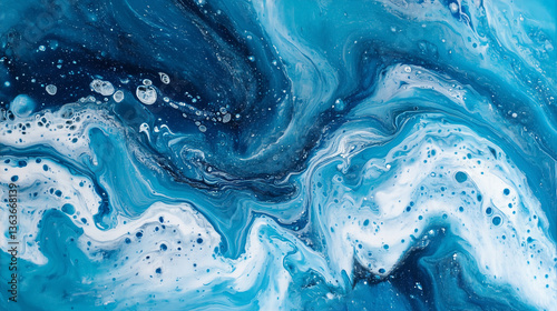 Acrylic paint texture swirling and mixing in a marble pattern
