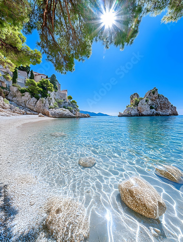 Secluded cove with crystal-clear turquoise water, sunlit beach, and rocky cliffs