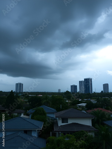 a storm rolling in over townhouses in Brisbane rain incoming