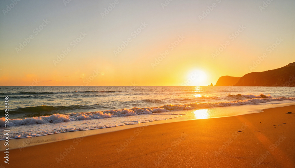 Fototapeta premium Sunset over ocean waves on sandy beach