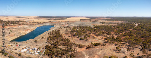 Old abandoned mine in the outback, Water Basin and Grain Fields in the background, 