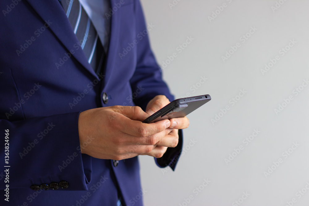 businessman-with-his-phone businessman-with-his-phone