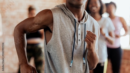 Group dance class with diverse participants. Energetic dance moves in a lively dance studio setting. Dance class in action. African American man dancing in dace studio. Dance class with diverse people