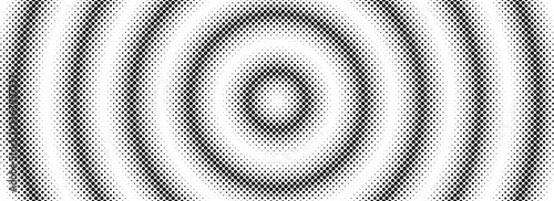Halftone circle background. Black and white dotted circular gradient. Radial comic target texture. Grunge rough round pop art rasterized backdrop. Fading dot epicenter wallpaper concept. Vector