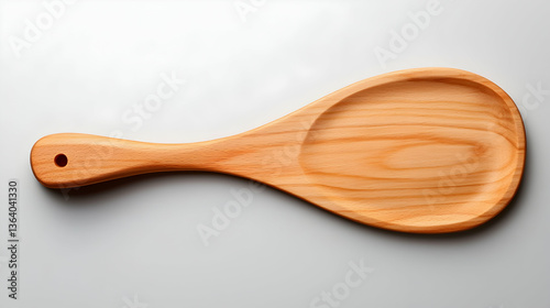 Light Brown Wooden Spoon on White Background