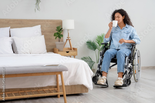 Young woman in wheelchair d...