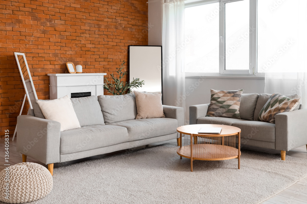 Fototapeta premium Interior of living room with sofas, fireplace and mirrors