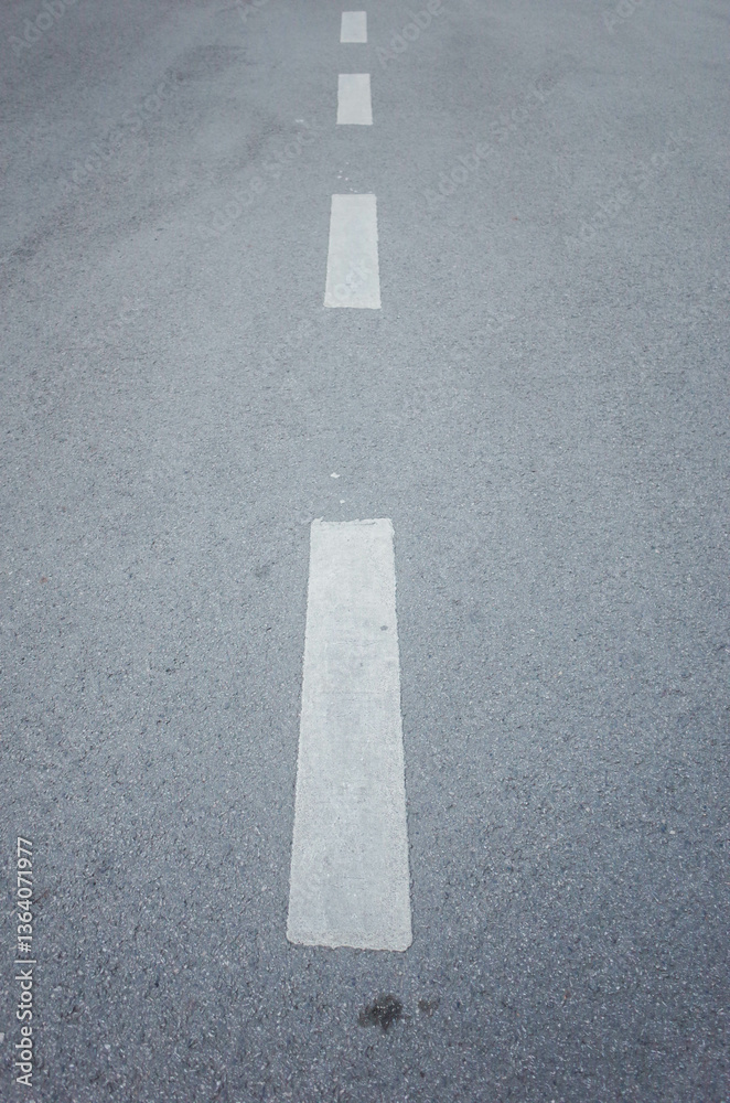 asphalt road with marking lines