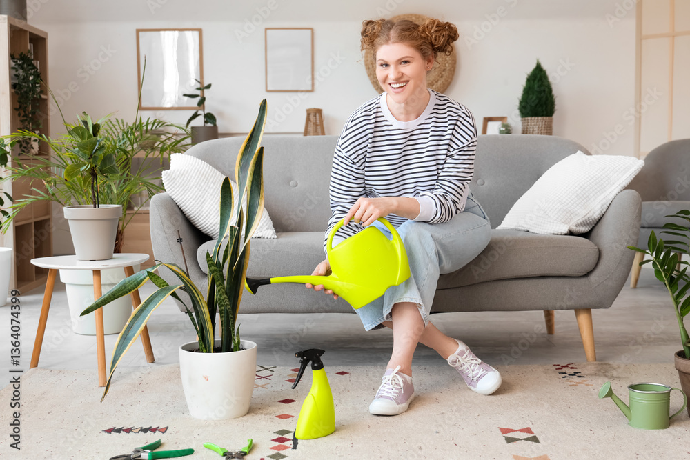 Young woman watering green plant at home Young woman watering green plant at home