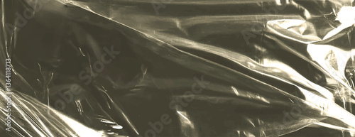 Glossy, crumpled plastic texture background in sepia tones. The sepia background adds a vintage, reflective effect. Plastic foil wrap texture background. Green background vector.