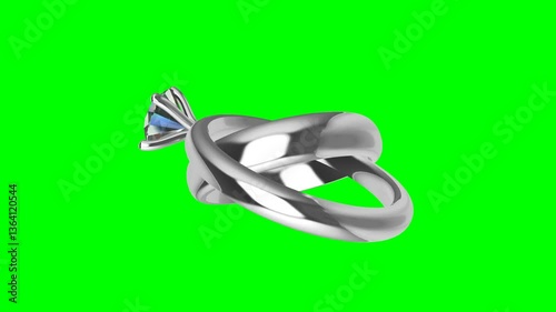White gold diamond wedding ring rotates on green screen
