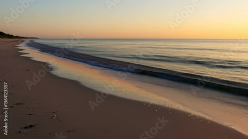 Wallpaper Mural Serene sunrise over tranquil beach, gentle waves Torontodigital.ca