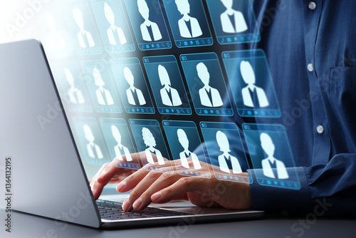 Customer data management and employee data management. CRM customer relationship management. Businessman using laptop computer to manage data.