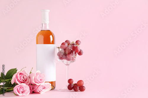 Bottle of pink wine with be...