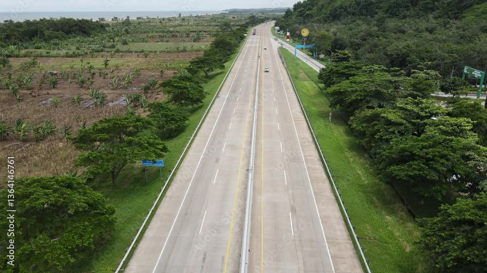 Aerial view of rice field and country road in Java Island, Indonesia. Aerial view of rice field and country road in Java Island, Indonesia.