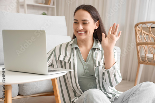 Beautiful woman with laptop...