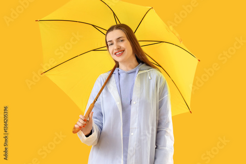 Stylish young woman in hood...