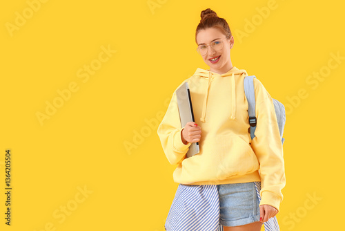 Stylish female student in h...