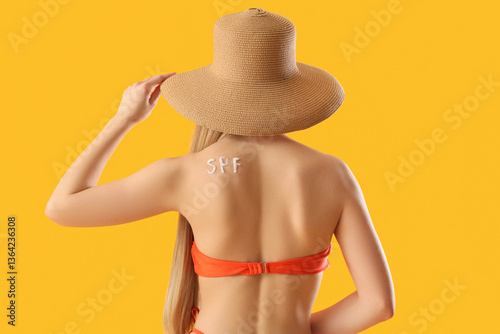Young woman in hat with wor...
