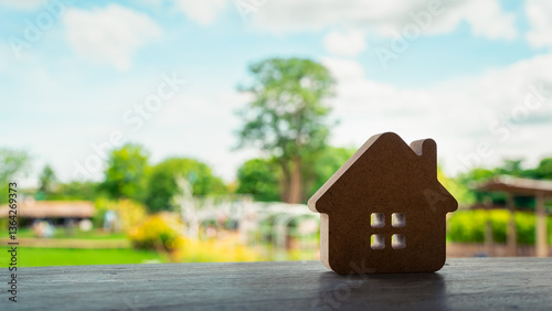 Conservationists promote symbol of home in natural setting with livable green scene along with house, It is a concept about living together with nature sustainably.