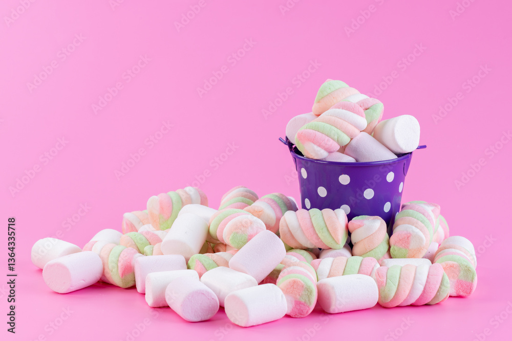 Sof and fluffy marshmallows in pastel colors fall into buckets speckled with bright purple on a bright pink background, creating a cheerful and dreamy aesthetic Sof and fluffy marshmallows in pastel colors fall into buckets speckled with bright purple on a bright pink background, creating a cheerful and dreamy aesthetic