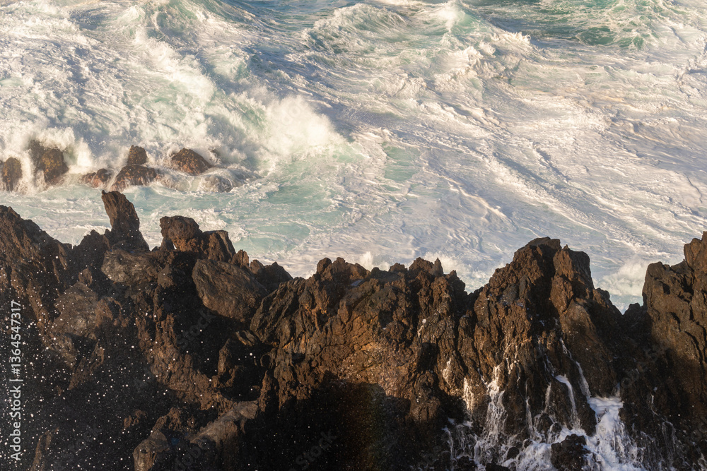Big powerful storm waves in Porto Moniz, on the Madeira Atlantic coastline