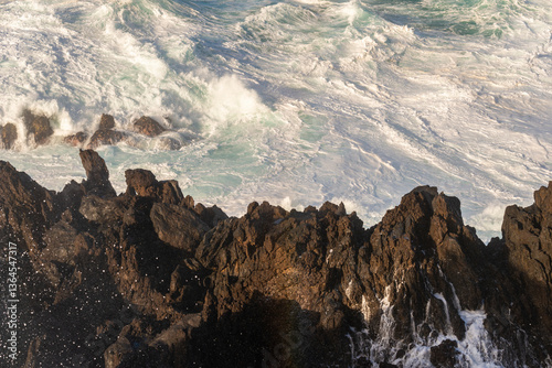 Big powerful storm waves in Porto Moniz, on the Madeira Atlantic coastline