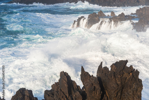Big powerful storm waves in Porto Moniz, on the Madeira Atlantic coastline