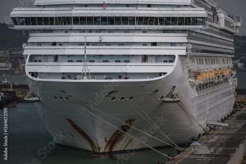 Family cruiseship or cruise ship liner Favolosa in Civitavecchia Rome, Italy port on grey windy day grey sky during Mediterranean autumn winter cruising dream vacation