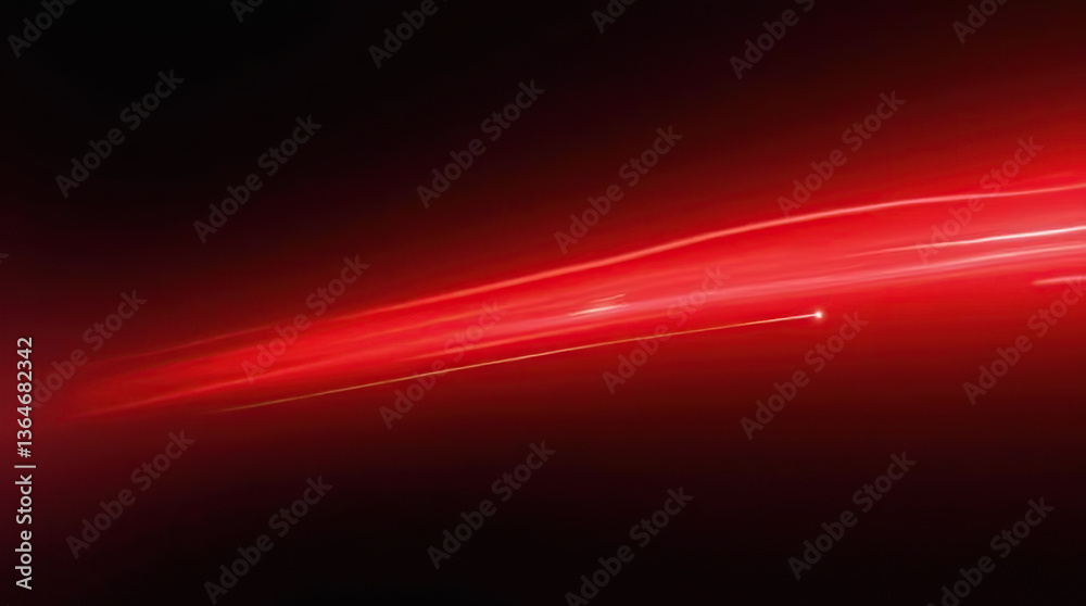 Fototapeta premium A red, fast-moving light line against a black background, evoking the feeling of speed, digital technology, and rapid motion in a futuristic design.