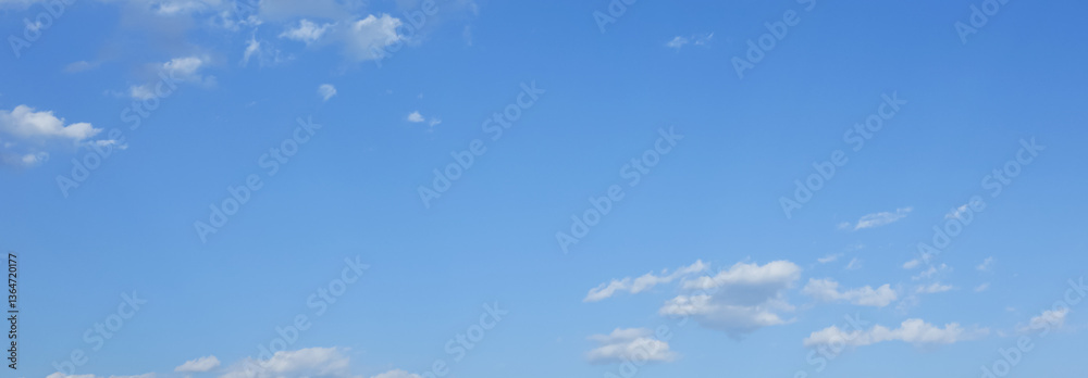 blue sky and fantastic soft white clouds , horizontal shape with space for design. Web banner. Wide. Panoramic. Website header