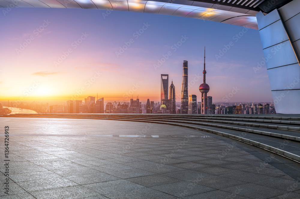 Empty square platform and city skyline with modern buildings scenery at sunset in Shanghai