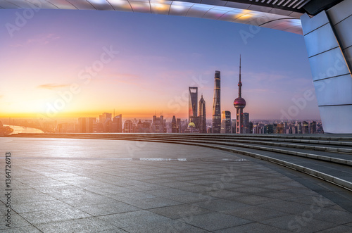 Obraz na płótnie Empty square platform and city skyline with modern buildings scenery at sunset in Shanghai w salonie