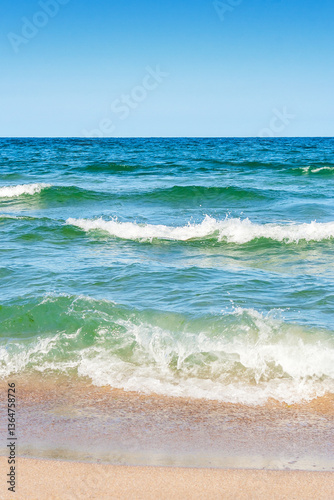 Obraz na płótnie sea scenery in summer. beach with golden sand. wonderful vacation background with transparent calm waves and blue sky. wave splash w salonie