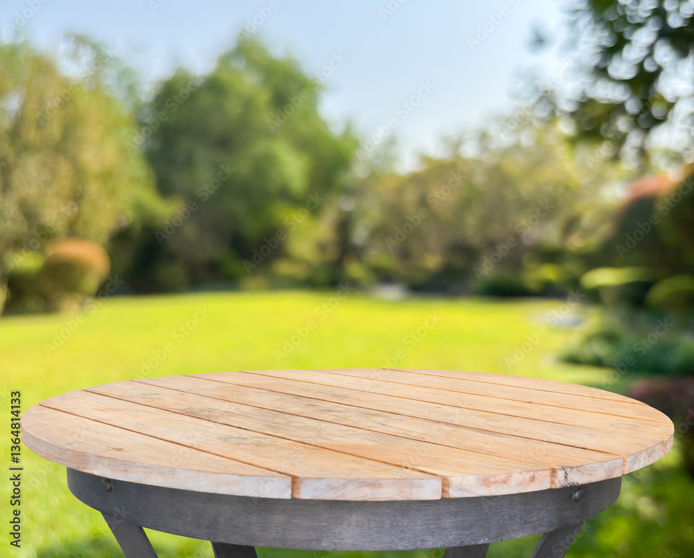 Fototapeta premium Empty round wood table top with abstract blur park garden background