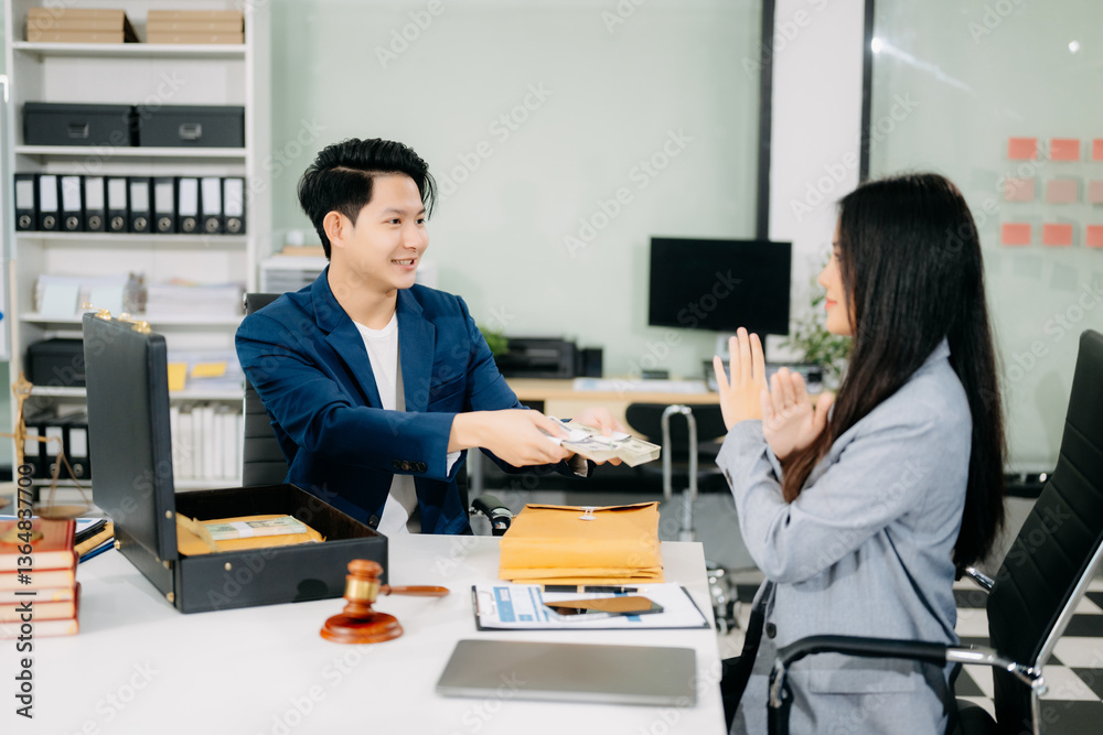 justice and law concept.passing bribe money in the envelop at lawyer office. justice and law concept.passing bribe money in the envelop at lawyer office.