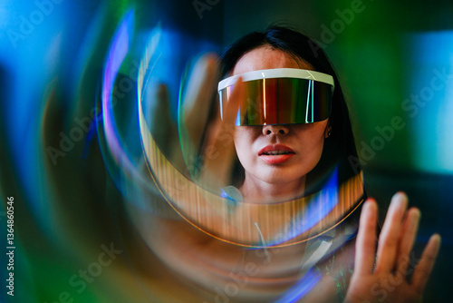 Woman wearing futuristic glasses with neon lights and a surreal prism effect