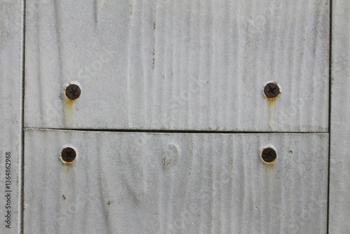 old wooden door with metal handle