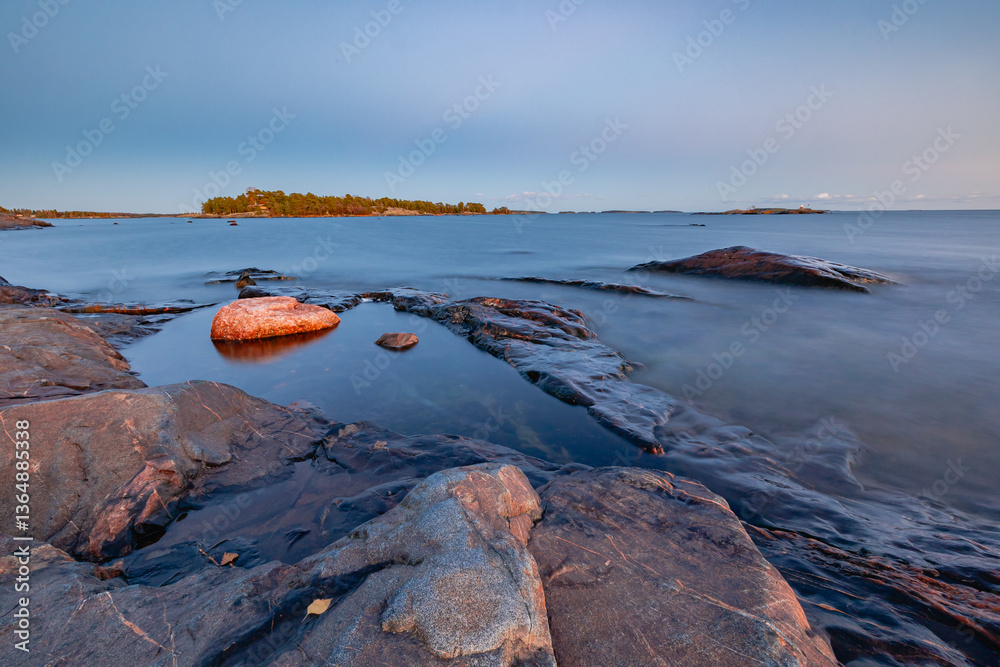 red rocks and blue sea