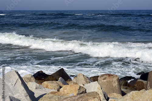 Władysławowo, Kaszubia, Pomerania, Poland, Europe - Baltic Sea seen from breakwater constructed of concrete tetrapod dolosse with steel eyes, protection of shore erosion, tides, strong waves, currents